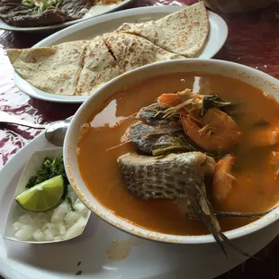 Caldo pescado and chicken quesadilla