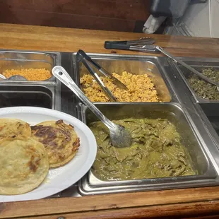 Breakfast offerings April 2024. Gorditas and bistek con nopales- front. Rice diff  bistek con nopales no sauce in back