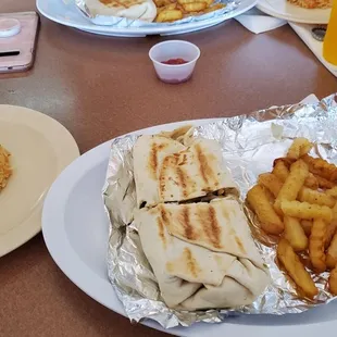 Burrito with fries and rice