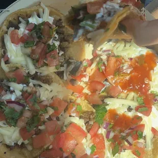 super tacos came w/ asada, cheese, sour cream & pico de gallo