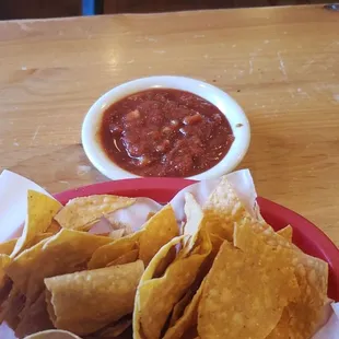 Rancid corn chips and flavorless salsa.