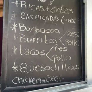 Menu.  No prices listed.  Quesadilla is $8 and tacos are $3.  Not sure prices for the rest.