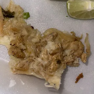 Chicken quesadilla.  I already ate almost all of it and thought I should take a picture of the inside.  It's that good, y'all.