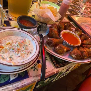 Loco Dip/chicken wings. Dip wing in red sauce then drizzle loco dip over  wing!!!. next level palate experience is like