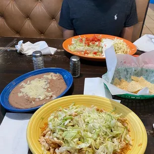 He got one of the burritos and I got Pollo cheese dip with beans on the side