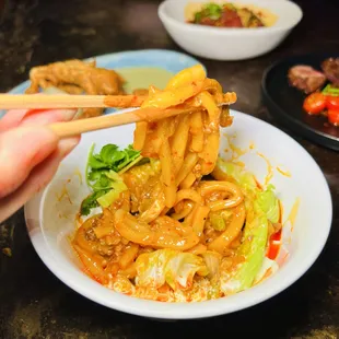 luck udon with szechuan stir-fry sauce, cilantro minced beef, lime yogurt and chili oil