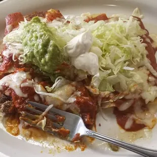 Four enchilada combo; dos con queso, dos con res... stick with the queso until they upgrade the beef.