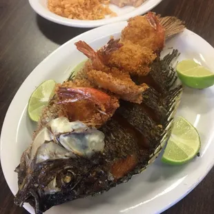 Deep fried tilapia fish topped with your choice of shrimp these are breaded