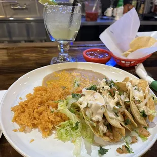 Delicious Fish taco combo with rice and refried beans as good as it gets!