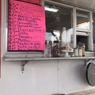 a menu on a food truck