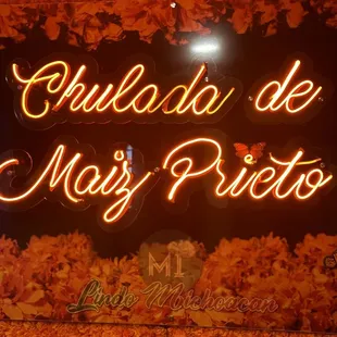 a neon sign for a mexican restaurant