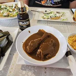 Mole Chicken with unfilled tamales