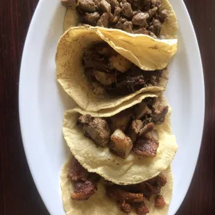 Pork, beef head, &amp; steak tacos before the salsa, etc.