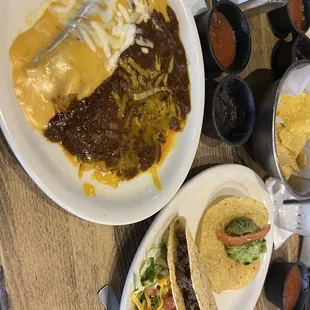 Carmen Plate- two enchiladas, guacamole tostada and beef crispy taco