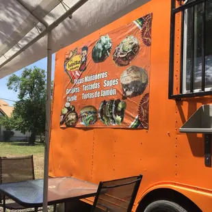 an orange food truck