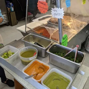 Their salsa/topping station is inside the grocery store.