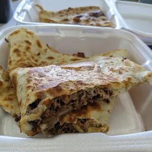 I&apos;ll share with you... Just a photo of one of our quesadillas :P sorry, not actually sharing it with you though. It&apos;s flavourful and juicy!