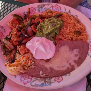 a plate of mexican food on a table