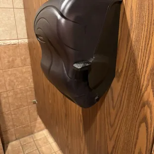 Paper towel dispenser next to the door. Perfect if you want to wrap the handle to open the door