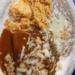 First plate of my Special Dinner the tamale and enchilada with rice and beans