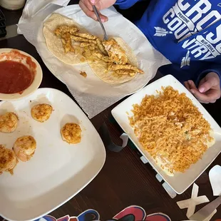 a person cutting food on a table