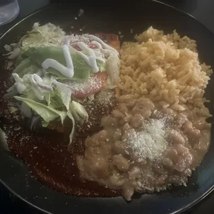 Cheese enchiladas with rice and Beans... Don't  let looks deceive you....