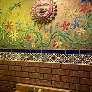 a colorful mural on the wall