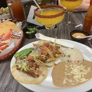 Shrimp Tacos w/ side of avocado and chipotle sauce. Mango margarita.