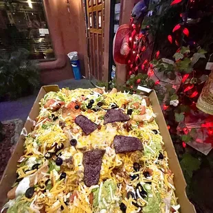 The Appetizer Supreme. A gargantuan smorgasbord of goodness! It fills a whole pizza box and weighs more than a small child!