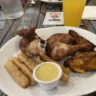 Peruvian chicken with fried yuca and fried plantain