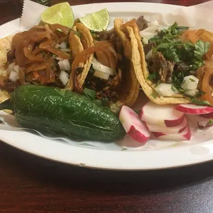 Tacos pastor,chorizo and lengua.