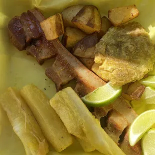 Plato de Chicharron (Pork Skin) with papas, fried yuca, patacone