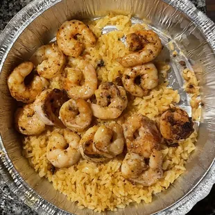 a bowl of shrimp and rice