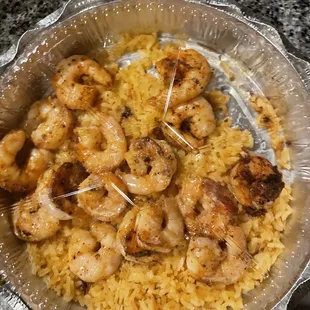 a bowl of shrimp and rice