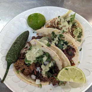 three tacos on a plate