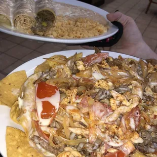 Our 3 white enchiladas &amp; our Super Fajita Nachos.