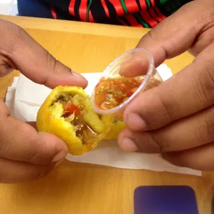 Empanada with the house picante (hot sauce)