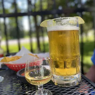 a glass of beer on a table