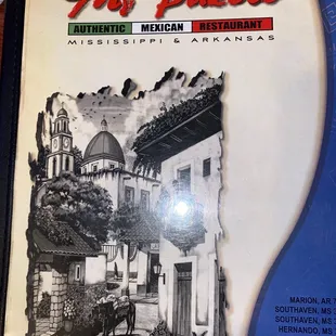 a black and white photo of a mexican restaurant