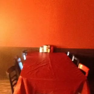 a table with a red table cloth