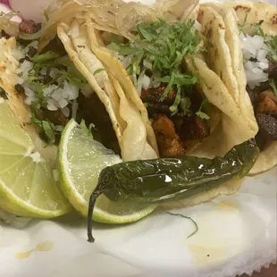 Al Pastor tacos! Salsa is homemade and is sooooo flavorful.
