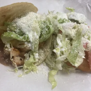 Left is a Gordita and the right is an empanada. Both were next level.