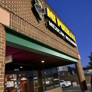 the front entrance of a restaurant