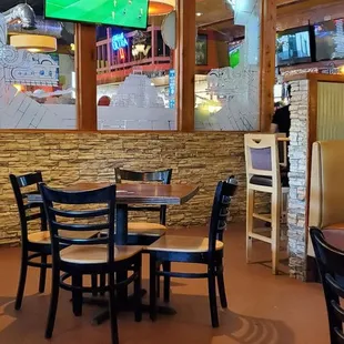 a table and chairs in a restaurant
