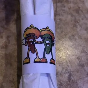 a napkin with a picture of two cartoon characters on it