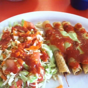Flautas With lots of salsa.