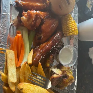 Hot wings, ribs, chicken, and fries