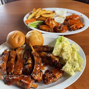 Ribs, Potato Salad, rolls. Wings, fries, ranch.