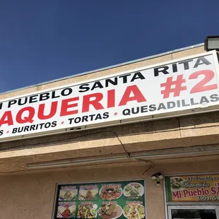 The exalted crimson signage.