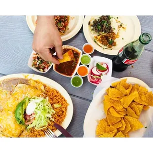 Carnitas burrito, tacos, chips, ceviche